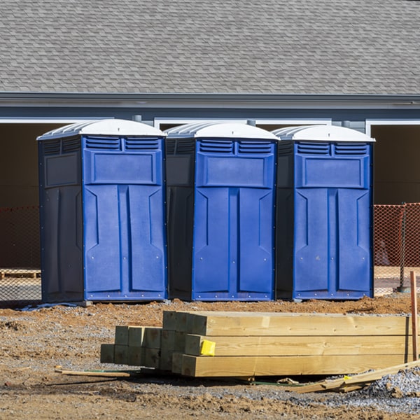 what is the cost difference between standard and deluxe portable restroom rentals in Brookeland TX